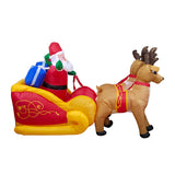 Santa Claus driving a sleigh pulled by elk